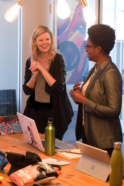 Christina speaking with Noel & Co. client