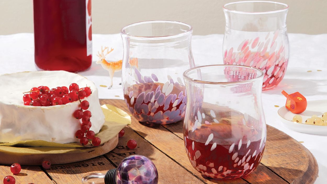 Uncommon Goods wine glasses and charcuterie board